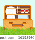 Open basket for a picnic with tableware and foods 39358560