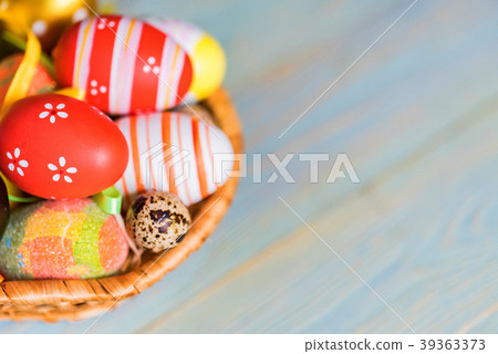 Several colorful Easter eggs in basket close Several colorful Easter eggs in basket close 39363373
