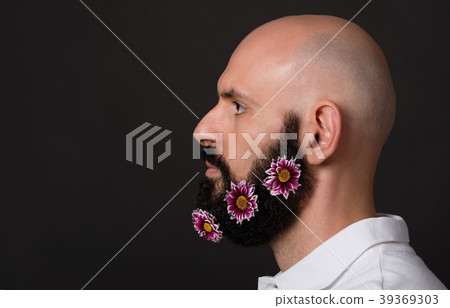 Profile of bald unshaven man with beard with Profile of bald unshaven man with beard with 39369303