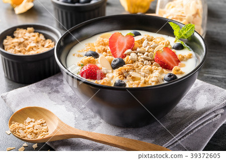 Muesli on bowl for breafast Muesli on bowl for breafast 39372605
