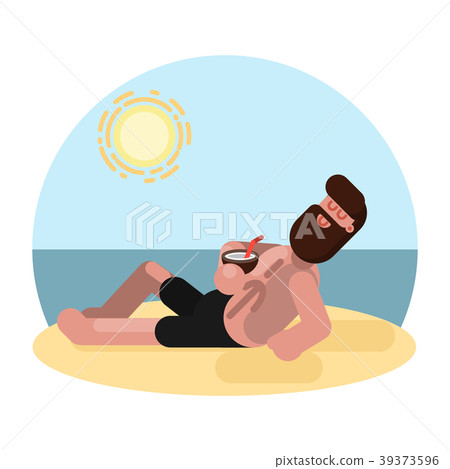 Man laying on beach with cocktail Man laying on beach with cocktail 39373596