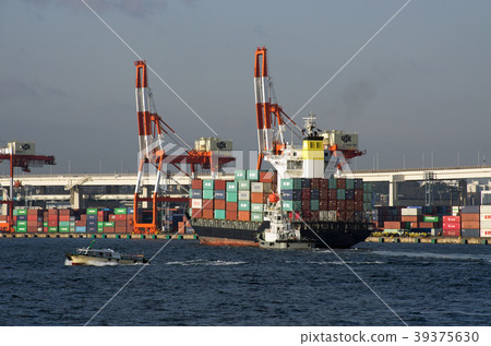 Cargo ship docked at container wharf 39375630