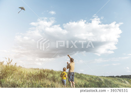 Joyful father and son playing together Joyful father and son playing together 39376531