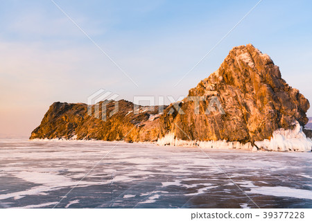 Rock on frozen water lake in Baikal Russia 39377228