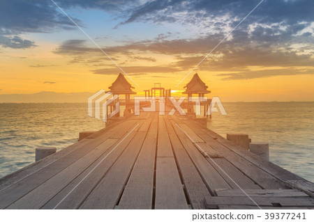 Wooden walkway over sea coast skyline Wooden walkway over sea coast skyline 39377241