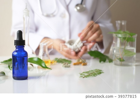 scientist hand pour,drop oil or serum laboratory 39377815