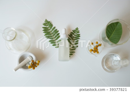 scientist hand pour,drop oil or serum laboratory 39377821