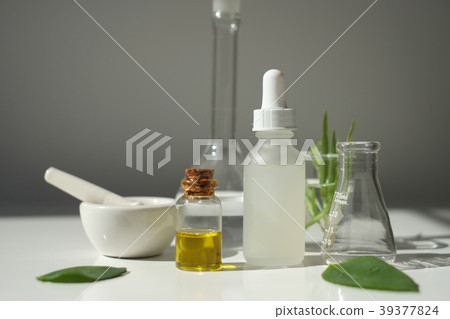 scientist hand pour,drop oil or serum laboratory 39377824