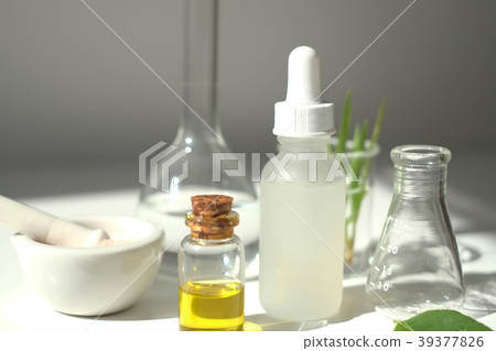 scientist hand pour,drop oil or serum laboratory scientist hand pour,drop oil or serum laboratory 39377826