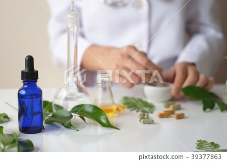 scientist hand pour,drop oil or serum laboratory scientist hand pour,drop oil or serum laboratory 39377863