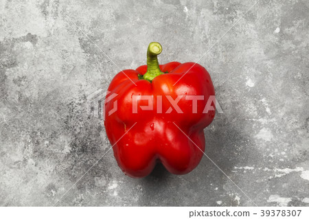 Red bell pepper on gray background. Top view 39378307