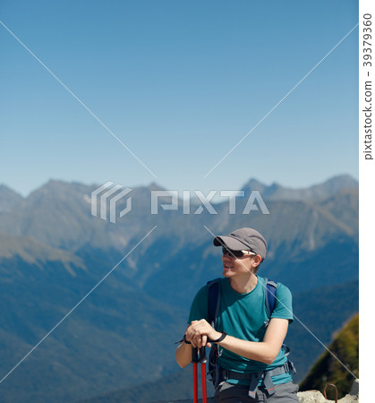 Photo of man in sunglasses with sticks 39379360