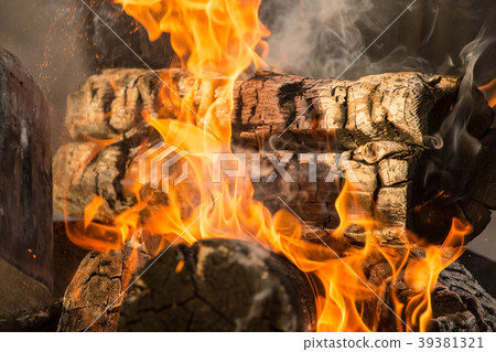 Burning coal from wood as a background 39381321
