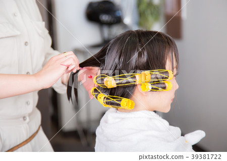 Perm at the hairdresser 39381722