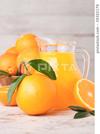 Glass jar of raw organic fresh orange juice Glass jar of raw organic fresh orange juice 39383179