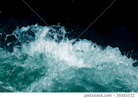 Splash of stormy water in the ocean on a black Splash of stormy water in the ocean on a black 39383532