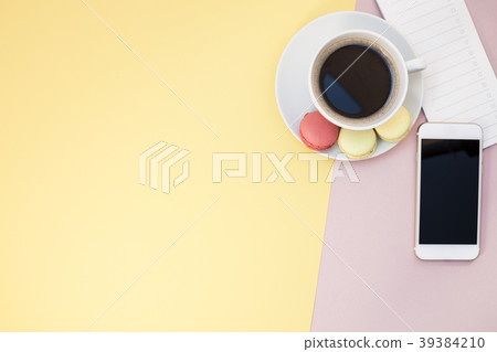Flat lay of coffee cup with macaroons Flat lay of coffee cup with macaroons 39384210