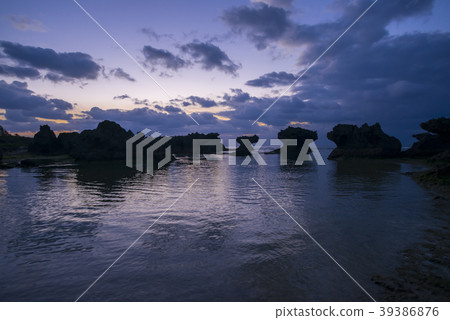 Okinerabu Island Ujiji beach shaped rock dawn Okinerabu Island Ujiji beach shaped rock dawn 39386876