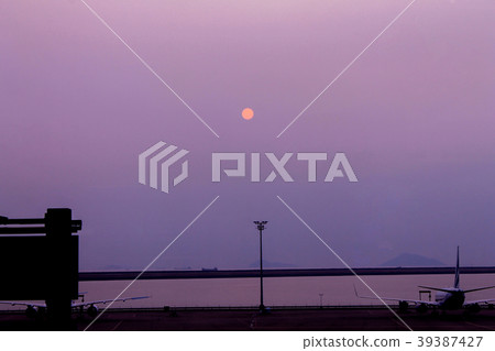 sunrise at Macau international airport with ocean sunrise at Macau international airport with ocean 39387427
