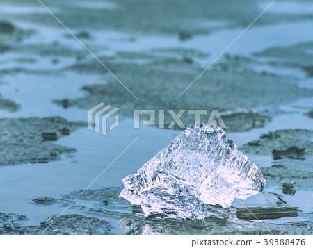 Blue ice. Ice and cracked ice on melting glacier 39388476
