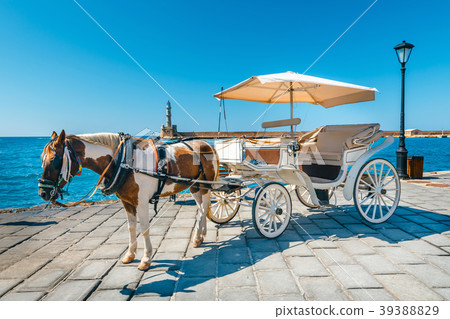 Horse carriage in old port of Chania on Crete 39388829
