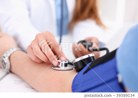 Female doctor arms make medic procedure closeup 39389134