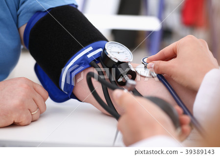 Female doctor arms make medic procedure closeup Female doctor arms make medic procedure closeup 39389143