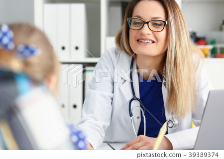 Little child with father at pediatrician reception Little child with father at pediatrician reception 39389374