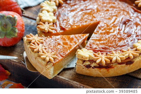 Piece of traditional american pumpkin pie. 39389485