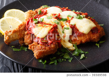 Milanesa a la napolitana Beef cutlet breaded 39389598