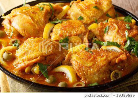 Slowly braised chicken with salted lemons, onions Slowly braised chicken with salted lemons, onions 39389689