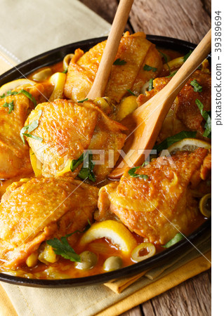 tajine chicken with salted lemons, onions tajine chicken with salted lemons, onions 39389694