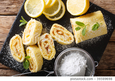 Traditional lemon roll with fruit curd, with mint 39389698