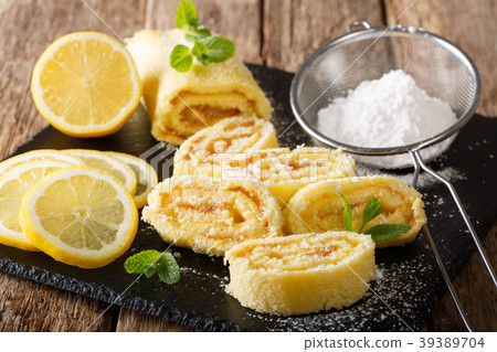 Traditional lemon roll with fruit curd, with mint Traditional lemon roll with fruit curd, with mint 39389704