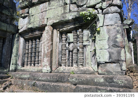 Carved columns, rail-posts, in temple ruin, Siem r Carved columns, rail-posts, in temple ruin, Siem r 39391195