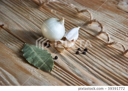 On the wooden table, seasonings 39391772