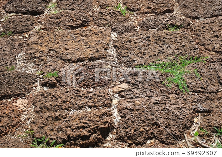 Red Rugged Laterite Stone Blocks Wall Background 39392307