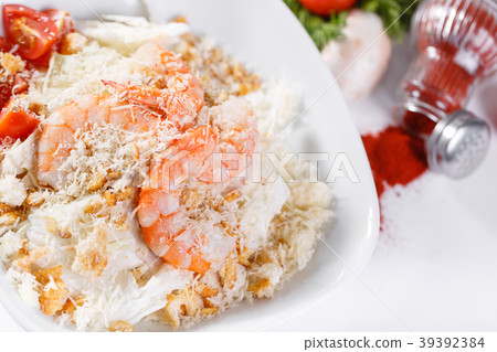 Caesar Salad with Royal shrimps . Comprises Caesar Salad with Royal shrimps . Comprises 39392384