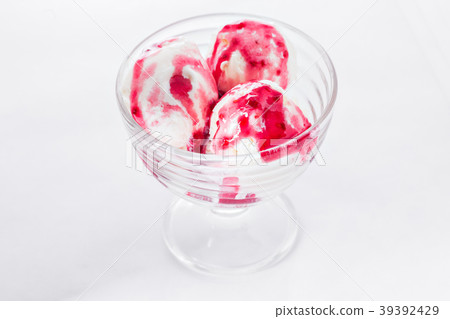 Vanilla ice cream with raspberry syrup on white Vanilla ice cream with raspberry syrup on white 39392429