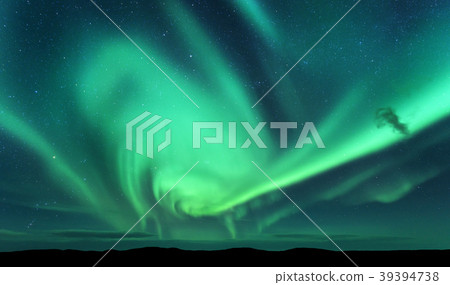 Aurora borealis and silhouette of hill. Lofoten Aurora borealis and silhouette of hill. Lofoten 39394738