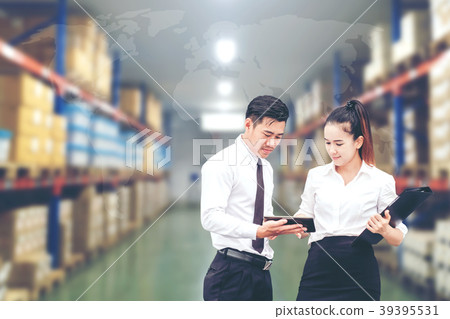 Asian Business worker in warehouse  39395531