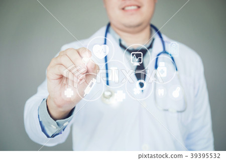 Doctor pointing health care icon on background Doctor pointing health care icon on background 39395532