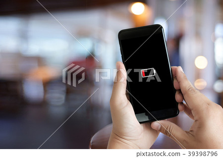 Close up man hands using smart phone battery  39398796
