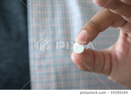 Medicine and health care concept man pours th 39399384