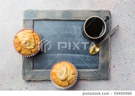 Shot with muffin and coffee cup 39400990