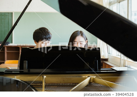 Student playing the piano Student playing the piano 39404528