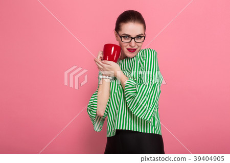Businesswoman with hair bun and cup 39404905