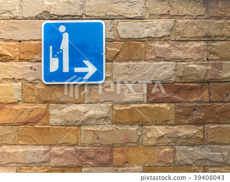 WC or toilet sign on brick wall 39408043