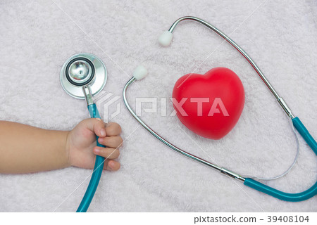 medical instruments stethoscope  hand of baby girl 39408104