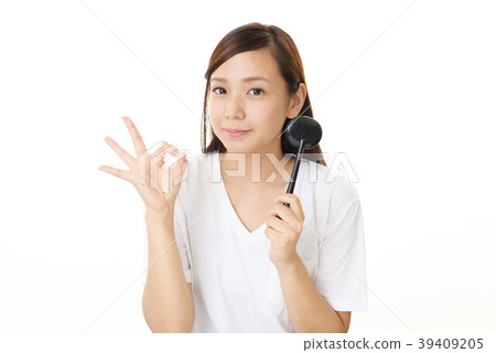 Woman under eye exam Woman under eye exam 39409205